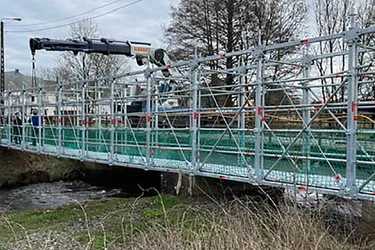 Header voetgangersbrug Raxhon