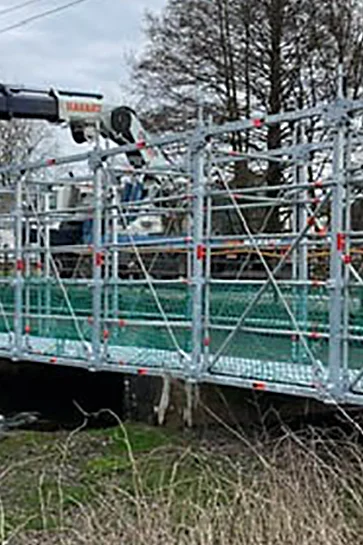 Header voetgangersbrug Raxhon